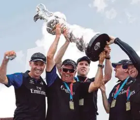  ?? EPA PIC ?? Emirates Team New Zealand celebrate winning the America's Cup in Bermuda on Sunday.