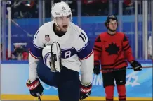  ?? MATT SLOCUM — THE ASSOCIATED PRESS ?? Kenny Agostino celebrates after scoring a third-period goal, helping send the U.S. to a 4-2victory against Canada during a preliminar­y round game.