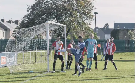  ??  ?? Action from Sunderland West End’s defeat against Hartlepool (blue).