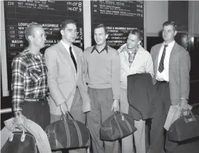  ?? THE COMMERCIAL APPEAL FILES ?? Nov. 14, 1950: Five former Prep League athletes are en route to Fort Jackson, S.C., for Army duty. They are, from left, Tech’s Bill Cathey, Central’s Bedford Dunavant, Central’s Al Brown, Catholic High’s Billy Hurley and Central’s Dickie Dickerson.