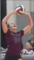  ?? PETE BANNAN – DIGITAL FIRST MEDIA ?? Garnet Valley’s Rachel Cain sets a ball in the first game of what became a3-0 Jaguars victory over Emmaus in a PIAA Class4A tourney opener at Upper Dublin High Tuesday.