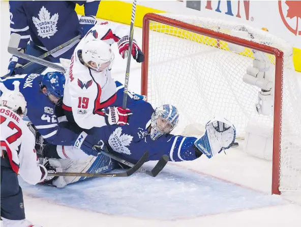  ?? — PETER J. THOMPSON/POSTMEDIA NEWS ?? Washington Capitals forward T. J. Oshie scored the opening goal on Maple Leafs goalie Frederik Andersen en route to a 5-4 Capitals victory in Game 4 of the first round NHL playoff series at Toronto’s Air Canada Centre on Wednesday.