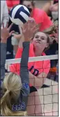  ?? (NWA Democrat-Gazette/
J.T. Wampler) ?? Springdale Har-Ber’s Kyla Club (above) spikes the ball over Kate Miller of Rogers during the Lady Wildcats’ 25-15, 25-12, 25-21 victory on Thursday at Springdale.