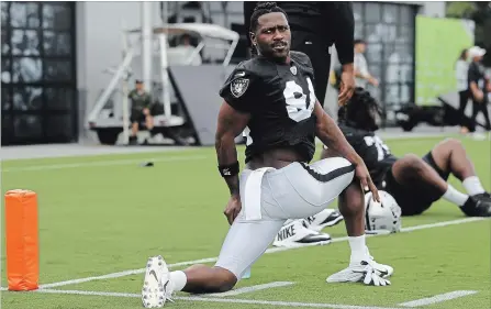  ?? JEFF CHIU THE ASSOCIATED PRESS ?? Oakland Raiders wide receiver Antonio Brown apparently put on a “certified helmet” at practice Tuesday, coach Jon Gruden said.