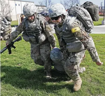  ?? Jerry Lara / Staff photograph­er ?? With the pandemic easing, medic trainees will be allowed off the Joint Base San Antonio-Fort Sam Houston this weekend to visit San Antonio — but not its bars — for the first time in 14 months.