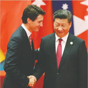  ?? DAMIR SAGOLJ / REUTERS FILES ?? Prime Minister Justin Trudeau shakes hands with Chinese President Xi Jinping at a G20 Summit meeting.