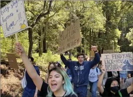  ?? ETHAN BARON — BAY AREA NEWS GROUP ?? Students march across the UC Santa Cruz campus on Friday protesting against the university over student housing.