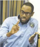  ?? (Photos: Naphtali Junior) ?? Political Awareness and Respect Initiative member Kahlil Hutchinson speaking at this week’s Jamaica Observer Monday Exchange. Hutchinson said politician­s need to follow up their words with action.