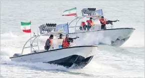  ?? Picture: AFP/File ?? Iranian Revolution­ary Guards in speedboats. Iran’s Revolution­ary Guards said on July 18, 2019, they had detained a “foreign tanker” and its crew for allegedly smuggling fuel.