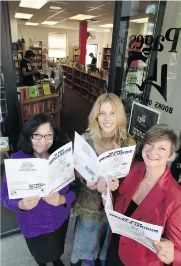  ?? Gavin Young, Calgary Herald ?? Pages on Kensington co-owner Simone Lee, right, with author Rona Altrows, left, and illustrato­r Sara-Joy Geddes, hold copies of the children’s book, The River Throws a Tantrum, that is being used to raise money for flood relief.