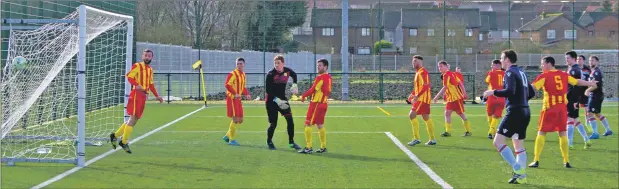  ?? Match report and photos: Derke Black ?? Donald Campbell rifles this shot into the back of the Arkleston net to give Saints a 2- 0 lead at Barrhead on Saturday.