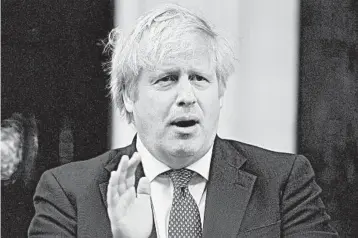  ?? VICTORIA JONES/PA WIRE ?? With more than 35,000 dead in the U.K. from COVID-19, Boris Johnson’s handling of the crisis has come under fire.