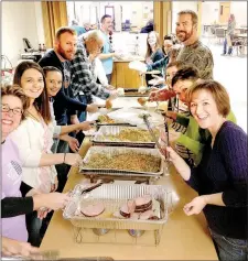  ?? Photo submitted ?? Volunteers served Thanksgivi­ng meals during Siloam Springs First United Methodist Thanksgivi­ng dinner last year.