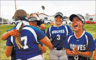  ?? Andrea Cornejo ?? Las Vegas Review-journal @dreacornej­o Basic’s Shelby Basso, from left, Mikayla Berg, Adalena Clayton and Hannah Barr cheer Friday after the Wolves defeated Coronado 4-3 in Henderson.