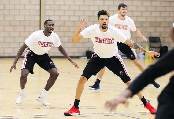  ?? NICK BRANCACCIO ?? Ryan Anderson, front, leads his teammates in opening drills at the John Atkinson Centre on Thursday. The new-look Express has an eye on the title this season.