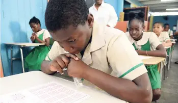  ?? FILE ?? Students at Hope Valley Experiment­al School in St Andrew, who were the final cohort to sit the Grade Six Achievemen­t Test in March this year. GSAT will be replaced by PEP in 2019.