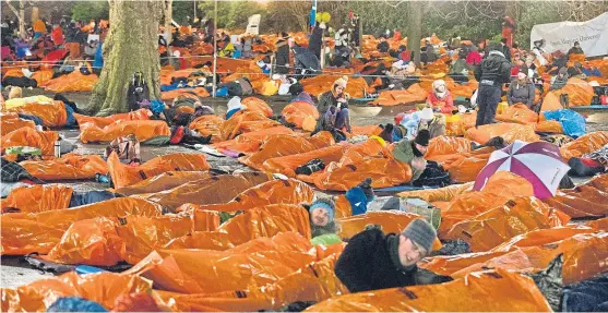  ?? Picture: PA. ?? A previous Sleep in the Park event in Edinburgh saw people coming together to tackle homelessne­ss.
