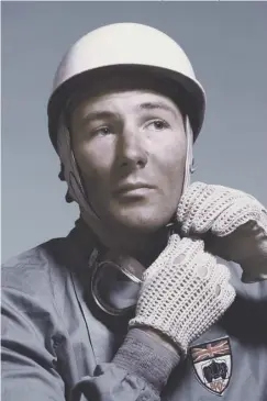  ?? PICTURE: JOHN PIERCY/HULTON ARCHIVE/GETTY IMAGES ?? Sir Stirling Moss, motor racing driver. Born: 17 September, 1929 in London. Died: 12 April, 2020, in London aged 90. 0 A portrait of Sir Stirling Moss taken around 1955. He is wearing the badge of the British Racing Drivers’ Club