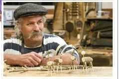  ??  ?? TINY ANTLERS: Wood and sculpture artisan Andrew MacDonald is making wooden reindeers for the market.