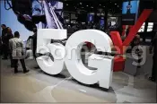  ?? PATRICK T. FALLON / BLOOMBERG ?? 5G is expected to offer download speeds that rival or even exceed what many consumers receive on their home internet connection­s.