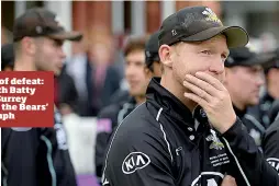  ??  ?? Face of defeat: Gareth Batty and Surrey after the Bears’ triumph