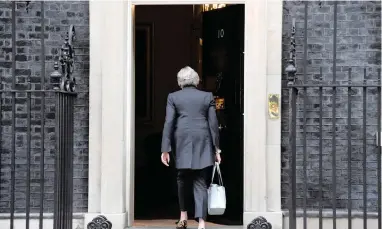  ?? PICTURE: REUTERS ?? Britain’s Prime Minister Theresa May arrives at 10 Downing Street in central London yesterday.