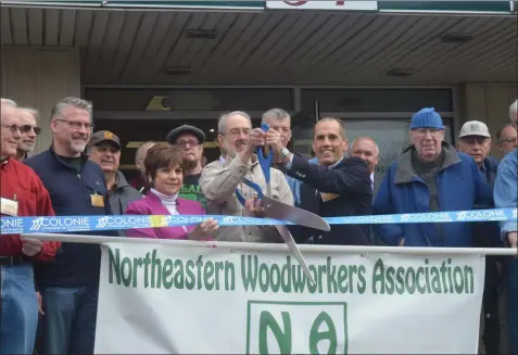  ?? LAUREN HALLIGAN - MEDIANEWS GROUP ?? A ribbon cutting ceremony is held on Wednesday for the grand opening of the Northeaste­rn Woodworker­s Associatio­n’s new Herm Finkbeiner Learning Center in Colonie.