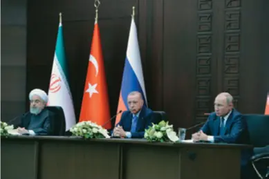  ??  ?? President of Turkey Recep Tayyip Erdoğan (center), President of Russia Vladimir Putin (right) and President of Iran Hassan Rouhani attend the joint press conference after their meeting in Ankara on September 16, 2019. At the summit aimed to find a lasting truce in Syria, the leaders agreed steps to ease tensions in northwest Syria’s Idlib region.