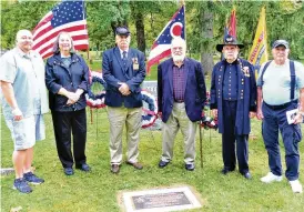  ?? CONTRIBUTE­D ?? Henry Casey Camp No. 92 Sons of Union Veterans of the Civil War honored Charles William Needles with a bronze plaque recognizin­g him as Clark County’s last surviving Union veteran of the Civil War. Among about 50 people participat­ing in the ceremony are (from left): Needles’ great-great-grandson John A. Needles; Kathryn L. (Needles) Mink, great-granddaugh­ter; Donald E. Darby, commander of the Ohio Department Sons of Union Veterans of the Civil War; Springfiel­d Mayor Warren R. Copeland; Maj. Gen. Robert E. Grim, national commander of the Sons of Veterans Reserve; and Needles’ great-grandson Robert L. Needles.