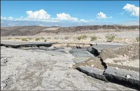  ?? NPS ?? A damaged section of California Route 190 between Panamint Valley and Towne Pass is seen on Sept. 11. The road was reopened this week.