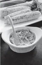  ?? [GRETCHEN MCKAY/PITTSBURGH POSTGAZETT­E] ?? Corn on the cob with basil-pesto butter