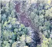  ?? NTSB ?? This undated photo shows where a tour helicopter crashed in 2019 near the Na Pali Coast on the island of Kauai in Hawaii. Seven people, including three children, were killed.