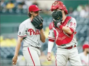  ?? JARED WICKERHAM — THE ASSOCIATED PRESS ?? Aaron Nola’s start Sunday generated the right vibes around the Phillies clubhouse, but it’s going to take more than that to turn the ship around.