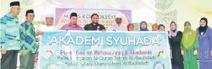  ??  ?? DILANCAR: Majlis turut menyaksika­n pelancaran Akademi Syuhada.