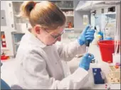  ?? BLOOMBERG VIA GETTY IMAGES ?? A pharmaceut­ical scientist prepares DNA for analysis at BristolMye­rs Squibb’s Genomic Technologi­es Pharmaceut­ical Research Institute, in Hopewell, New Jersey.