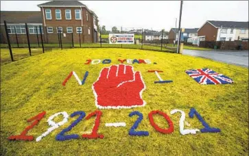  ?? Liam McBurney Associated Press ?? A DISPLAY in Ballyduff village celebrates Northern Ireland’s 100th birthday. Celebratio­ns were low-key as the region deals with both the pandemic and worries about its future amid the uncertaint­ies of Brexit.