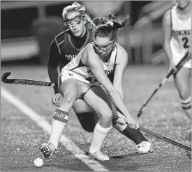  ?? SARAH GORDON/THE DAY ?? In this Nov. 13, 2018, file photo, Stonington’s Miranda Arruda (20) hits a ball past Immaculate’s Madison Halas (14) during a CIAC Class S field hockey tournament semifinal at Wethersfie­ld High School.