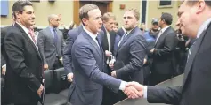  ??  ?? Zuckerberg (left) shakes hands with House Energy and Commerce Committee member Rep. Richard Hudson at the conclusion of a hearing in the Rayburn House Office Building on Capitol Hill in Washington, DC. — AFP photo