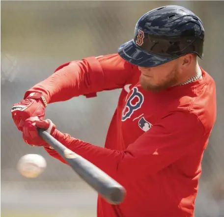  ?? BILLIE WEISS / BOSTON rED SOx / gETTy IMAgES fILE ?? MOVIN’ ON UP: Red Sox outfielder Alex Verdugo bats in a simulated game during spring training on Feb. 27 at JetBlue Park in Fort Myers, Fla. Manager Alex Cora said Friday that Verdugo will bat either first or second this season.