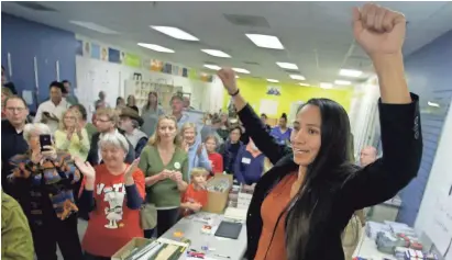  ?? CHARLIE RIEDEL/AP ?? Democratic candidate Sharice Davids, a former MMA fighter, wants to fight for Kansas.