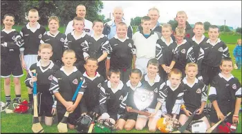 ?? Archives) (Pic: The Avondhu ?? Mill Rovers U12 hurlers and selectors after winning the North Cork league title in 2005.