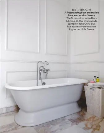  ??  ?? BATHROOM
A freestandi­ng bath and marble floor lend an air of luxury. The Tay cast-iron skirted bath tub, from £3,570, Drummonds; painted in Bone China Blue Pale absolute matt emulsion, £45 for 1ltr, Little Greene