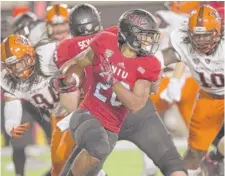  ?? | NORTHERN ILLINOIS ?? NIU running back Joel Bouagnon made senior night at Huskie Stadium something to remember Tuesday.