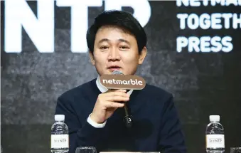  ?? Courtesy of Netmarble Games ?? Netmarble founder Bang Jun-hyuk speaks about the firm’s business strategies during the third Netmarble Together with Press event at Glad Hotel on Yeouido, Seoul, in January. Bang is expected to become the nation’s sixth-richest man in May when the firm...