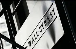  ?? MARK LENNIHAN — THE ASSOCIATED PRESS ?? Global stock markets are sharply lower on deepening worries over damage from the coronaviru­s pandemic. Benchmarks also fell in Paris, London and Frankfurt on Wednesday.