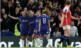  ?? Photograph: Nigel French/PA ?? Sjoeke Nüsken (second left) celebrates with her teammates after scoring Chelsea’s third goal.