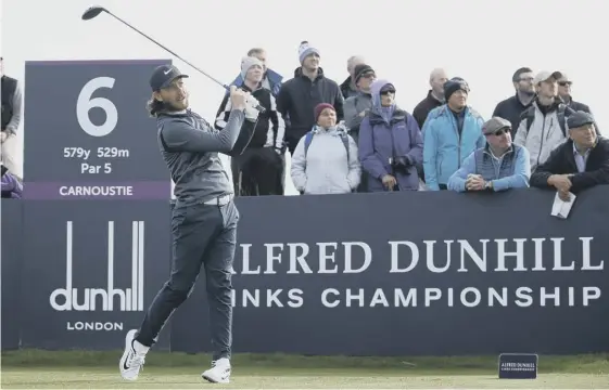  ??  ?? 2 Tommy Fleetwood plays from the sixth tee at Carnoustie during day two of the Alfred Dunhill Links Championsh­ip on his way to shooting a new course record 63.