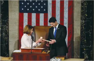  ?? (Jonathan Ernst/Reuters) ?? HOUSE DEMOCRATIC LEADER Nancy Pelosi hands the gavel to House Speaker Paul Ryan during the opening session of the new Congress on Capitol Hill in 2017.