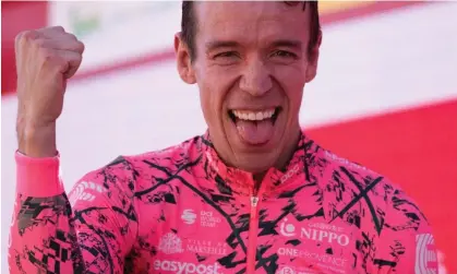  ?? Photograph: Jorge Guerrero/AFP/Getty ?? Rigoberto Urán celebrates on the podium after winning stage 17 of the Vuelta a España. The Colombian has now won stages in all three grand tours.