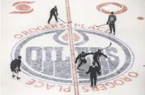  ?? JASON FRANSON/ASSOCIATED PRESS FILE PHOTO ?? Oilers players take part in drills July 13. The Canadian government has given its OK to start NHL training camps, citing ‘national interest grounds.’ It has issued an exemption to the mandatory 14-day quarantine period for NHL players and team staff to return to the country.